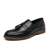 Mocasines de piel con borlas