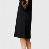 Bellezza Vestido Negro con Mangas de Malla y Corte Holgado